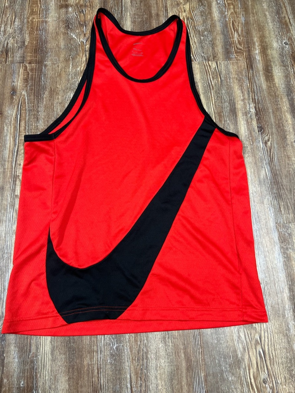 Nike red tank top with black swoosh